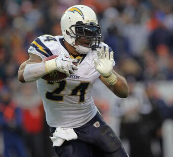 DENVER - JANUARY 02:  Running back Ryan Mathews #24 of the San Diego Chargers rushes against the Denver Broncos at INVESCO Field at Mile High on January 2, 2011 in Denver, Colorado. Mathews rushed for three touchdowns and 120 yards as the Chargers defeate