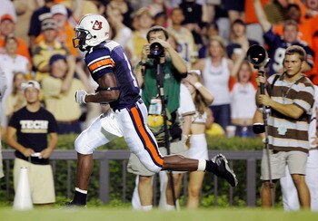 AUBURN, AL - SEPTEMBER 3:  Wide receiver Devin Aromashodu #1 of the Auburn Tigers breaks free for a first quarter touchdown against the Georgia Tech Yellow Jackets on September 3, 2005 at Jordan-Hare Stadium in Auburn, Alabama.  (Photo by Brian Bahr/Getty