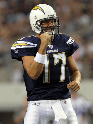 ARLINGTON, TX - AUGUST 21:  Philip Rivers #17 of the San Diego Chargers celebrates a touchdown against the Dallas Cowboys during a preseason game at Cowboys Stadium on August 21, 2011 in Arlington, Texas.  (Photo by Ronald Martinez/Getty Images)