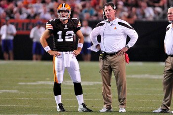 CLEVELAND, OH - AUGUST 19: Starting quarterback Colt McCoy #12 and head coach Pat Shurmur of the Cleveland Browns wait for a challenge ruling from the officials during the second quarter against the Detroit Lionsat Cleveland Browns Stadium on August 19, 2