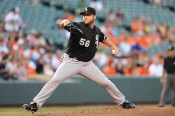 BALTIMORE, MD - AUGUST 11:  Mark Buehrle #56 of the Chicago White Sox pitches during a baseball game against the Baltimore Orioles at Oriole Park at Camden Yards on August 11, 2011 in Baltimore, Maryland.  (Photo by Mitchell Layton/Getty Images)