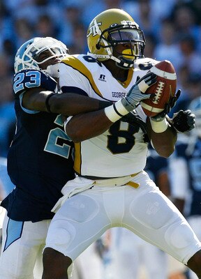 CHAPEL HILL, NC - NOVEMBER 08:  Receiver Demaryius Thomas #8 of the Georgia Tech Yellow Jackets pulls in this reception against Jordan Hemby #23 of the North Carolina Tar Heels during the game at Kenan Stadium on November 8, 2008 in Chapel Hill, North Car
