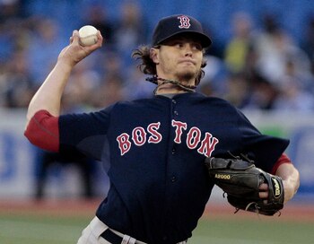 TORONTO, CANADA - JUNE 10:  Clay Buchholz #11 of the Boston Red Sox throws a pitch during MLB action against the Toronto Blue Jays at The Rogers Centre June 10, 2011 in Toronto, Ontario, Canada. (Photo by Abelimages/Getty Images)