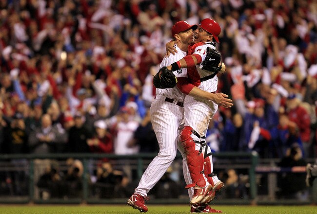 PHILADELPHIA - OCTOBER 06:  Roy Halladay #34 and Carlos Ruiz #51 of the Philadelphia Phillies celebrate Halladay's no-hitter and the win in Game 1 of the NLDS against the Cincinnati Reds at Citizens Bank Park on October 6, 2010 in Philadelphia, Pennsylvan