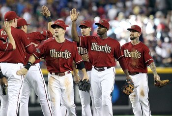 PHOENIX, AZ - AUGUST 07:  Justin Upton #10 of the Arizona Diamondbacks celebrates with teammates after defeating the Los Angeles Dodgers in the Major League Baseball game at Chase Field on August 7, 2011 in Phoenix, Arizona. The Diamondbacks defeated the