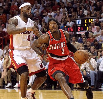 MIAMI, FL - MARCH 08:  Gerald Wallace #3 of the Portland Trail Blazers drives by LeBron James #6 of the Miami Heat during a game at American Airlines Arena on March 8, 2011 in Miami, Florida. NOTE TO USER: User expressly acknowledges and agrees that, by d