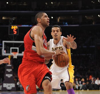 LOS ANGELES, CA - MARCH 20:  Nicolas Batum #88 of the Portland Trail Blazers is chased by Matt Barnes #9 of the Los Angeles Lakers at the Staples Center on March 20, 2011 in Los Angeles, California.  NOTE TO USER: User expressly acknowledges and agrees th