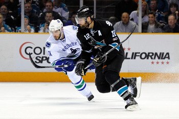 SAN JOSE, CA - MAY 20:  Patrick Marleau #12 of the San Jose Sharks and Ryan Kesler #17 of the Vancouver Canucks skate up ice in Game Three of the Western Conference Finals during the 2011 Stanley Cup Playoffs at HP Pavilion on May 20, 2011 in San Jose, Ca