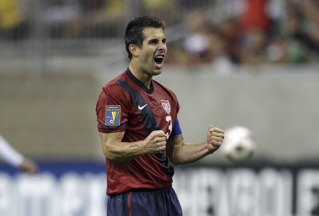 HOUSTON - JUNE 22:  Carlos Bocanegra #3 of the U.S.A. celebrates as the final wihistle blows as the U.S.A. defeated Panama 1-0 at Reliant Stadium on June 22, 2011 in Houston, Texas.  (Photo by Bob Levey/Getty Images)