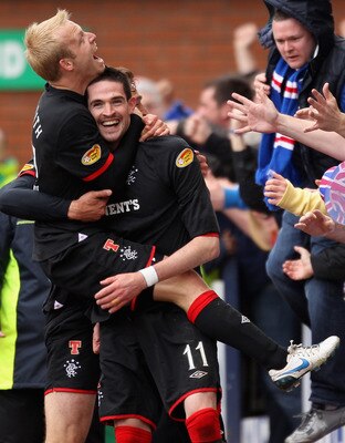 KILMARNOCK, SCOTLAND - MAY 15:  Kyle Lafferty and Steven Naismith of Rangers celebrate after scoring during the Clydesdale Bank Premier League match between Kilmarnock  and Rangers at Rugby Park on May 15, 2011 in Kilmarnock, Scotland  (Photo by Jeff J Mi