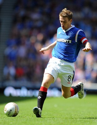 GLASGOW, SCOTLAND - JULY 23: Steven Davis of Rangers in action during the Clydesdale Bank Premier League match between Rangers and Hearts at Ibrox Stadium on July 23, 2011 in Glasgow, Scotland.  (Photo by Chris Brunskill/Getty Images)
