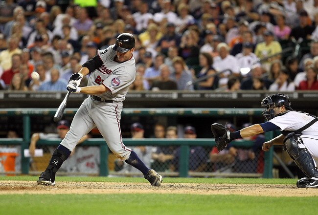 DETROIT, MI - AUGUST 15: DH, Jim Thome #25 of the Minnesota Twins hits his second home run of the game in the seventh inning and his 600th career home run making him only the eighth player in Major League Baseball history to achieve that milestone during