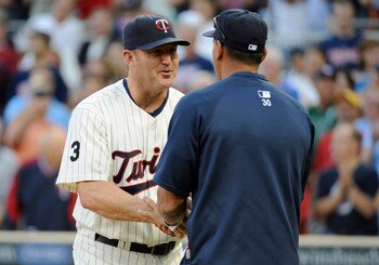 MINNEAPOLIS, MN - AUGUST 18: Alex Rodriguez #13 (R) of the New York Yankees shakes hands with Jim Thome #25 of the Minnesota Twins during a ceremony honoring Thome's 600th career home run before the game between the Minnesota Twins and the New York Yankee
