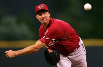 DENVER - MAY 15:  Starting pitcher Randy Johnson #51 of the Arizona Diamondbacks delivers against the Colorado Rockies as he earned his first win of the season on May 15, 2007 at Coors Field in Denver, Colorado. The Diamondbacks defeated the Rockies 3-0.