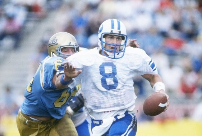 1 Oct 1983:  Quarterback Steve Young of the Brigham Young BYU Cougars runs down the field during a game against the UCLA Bruins at the Rose Bowl in Pasadena, California.  Brigham Young won the game 37-35. Mandatory Credit: Alvin Chung /Allsport