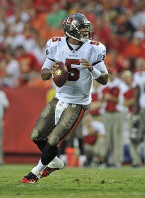 KANSAS CITY, MO - AUGUST 12:  Quarterback Josh Freeman #5 of the Tampa Bay Buccaneers in action during a game against the Kansas City Chiefs on August 12, 2011 at Arrowhead Stadium in Kansas City, Missouri.  (Photo by Peter Aiken/Getty Images)