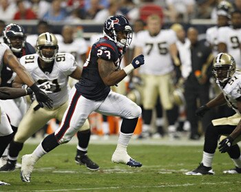 HOUSTON - AUGUST 20:  Running back Arian Foster #23 of the Houston Texans breaks loose on a 28 yard run against the New Orleans Saints at Reliant Stadium on August 20, 2011 in Houston, Texas.  (Photo by Bob Levey/Getty Images)
