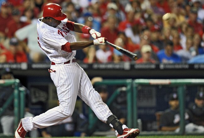 PHILADELPHIA, PA - AUGUST 23: John Mayberry Jr. #15 of the Philadelphia Phillies hits a three run home run in the third inning during the game against the New York Mets at Citizens Bank Park on August 23, 2011 in Philadelphia, Pennsylvania. (Photo by Drew