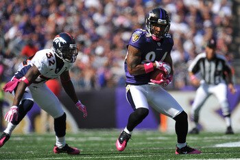 BALTIMORE, MD - OCTOBER 10: T.J. Houshmandzadeh #84 of the Baltimore Ravens makes a catch against the Denver Broncos at M&T Bank Stadium on October 10, 2010 in Baltimore, Maryland. Players wore pink in recognition of Breast Cancer Awareness Month. The Rav