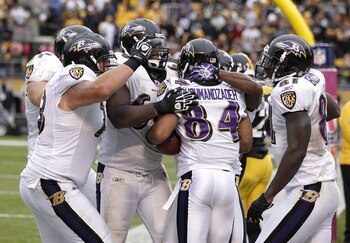 PITTSBURGH - OCTOBER 03: T.J. Houshmandzadeh #84 of the Baltimore Ravens celebrates his game winning touchdown with teammates while playing the Pittsburgh Steelers on October 3, 2010 at Heinz Field in Pittsburgh, Pennsylvania.  (Photo by Gregory Shamus/Ge