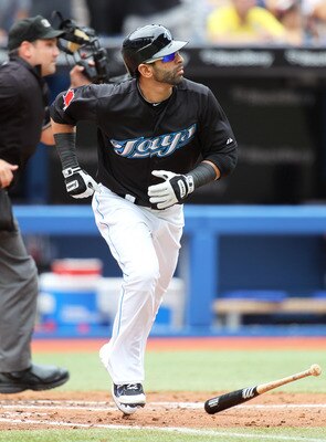 TORONTO, CANADA - AUGUST 14:  Jose Bautista #19 of the Toronto Blue Jays slams his 34th homerun of the season in a MLB game against the Los Angeles Angels of Anaheim on August 14, 2011 at the Rogers Centre in Toronto, Canada. (Photo by Claus Andersen/Gett