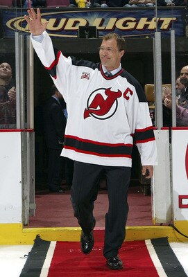 EAST RUTHERFORD, NJ - MARCH 02:  Former New Jersey Devil Scott Stevens waves to the crowd before dropping the ceremonial puck before the Devils play the Toronto Maple Leafs on March 2, 2007 at Continental Airlines Arena in East Rutherford, New Jersey.   (