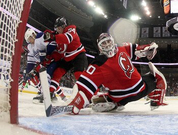 NEWARK, NJ - APRIL 06: Martin Brodeur #30 of the New Jersey Devils makes the second period save against the Toronto Maple Leafs at the Prudential Center on April 6, 2011 in Newark, New Jersey. The Devils defeated the Maple Leafs 4-2. (Photo by Bruce Benne