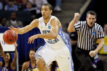 CHARLOTTE, NC - MARCH 20:  Kendall Marshall #5 of the North Carolina Tar Heels moves the ball while taking on the Washington Huskies during the third round of the 2011 NCAA men's basketball tournament at Time Warner Cable Arena on March 20, 2011 in Charlo