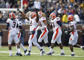 ANN ARBOR, MI - NOVEMBER 06:  Martez Wilson #2 of the Illinois Fighting Illini celebrates a first quarter interception with teammates while playing the Michigan Wolverines at Michigan Stadium on November 6, 2010 in Ann Arbor, Michigan.  (Photo by Gregory
