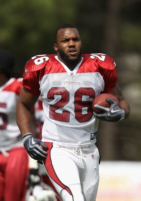 FLAGSTAFF, AZ - AUGUST 04:  Runningback Beanie Wells #26 of the Arizona Cardinals practices during the team training camp at Northern Arizona University on August 4, 2011 in Flagstaff, Arizona.  (Photo by Christian Petersen/Getty Images)
