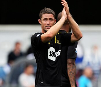 LONDON, ENGLAND - AUGUST 13:  Gary Cahill of Bolton applauds the fans after the Barclays Premier League match between Queens Park Rangers and Bolton Wanderers at Loftus Road on August 13, 2011 in London, England.  (Photo by Michael Steele/Getty Images)