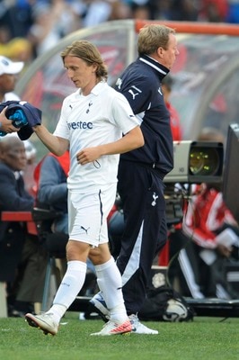 JOHANNESBURG, SOUTH AFRICA - JULY 23:  Manager Harry Redknapp greets Luka Modric of Tottenham during the 2011 Vodacom Challenge final match between Orlando Pirates and Tottenham Hotspur at Coca Cola Stadium on July 23, 2011 in Johannesburg, South Africa. 