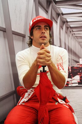 SPA FRANCORCHAMPS, BELGIUM - AUGUST 26:  Fernando Alonso of Spain and Ferrari prepares to drive during practice for the Belgian Formula One Grand Prix at the Circuit of Spa Francorchamps on August 26, 2011 in Spa Francorchamps, Belgium.  (Photo by Mark Th