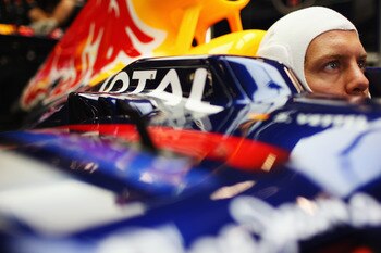 SPA FRANCORCHAMPS, BELGIUM - AUGUST 26:  Sebastian Vettel of Germany and Red Bull Racing prepares to drive during practice for the Belgian Formula One Grand Prix at the Circuit of Spa Francorchamps on August 26, 2011 in Spa Francorchamps, Belgium.  (Photo