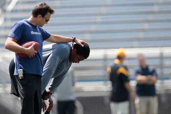 HEMPFIELD TOWNSHIP, PA - AUGUST 20:  Agent Drew Rosenhaus talks with Terrelle Pryor during his pro day at a practice facility on August 20, 2011 in Hempfield Township, Pennsylvania.  (Photo by Jared Wickerham/Getty Images)