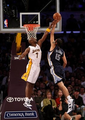 LOS ANGELES, CA - APRIL 12:  Hamed Haddadi #15 of the Memphis Grizzlies shoots against Lamar Odom #7 of the Los Angeles Lakers on April 12, 2009 at Staples Center in Los Angeles, California.  The Lakers won 92-75.  NOTE TO USER: User expressly acknowledge