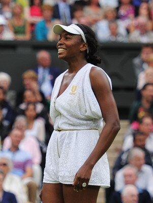 LONDON, ENGLAND - JUNE 22:  Venus Williams of the United States reacts to a play during her second round match against Kimiko Date-Krumm of Japan on Day Three of the Wimbledon Lawn Tennis Championships at the All England Lawn Tennis and Croquet Club on Ju