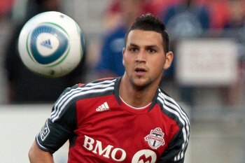TORONTO, CANADA - AUGUST 27: Peri Marosevic #70 of Toronto FC chases the ball against Justin Morrow #15 of San Jose Eathquakes during MLS action at BMO Field August 27, 2011 in Toronto, Ontario, Canada. (Photo by Abelimages/Getty Images)