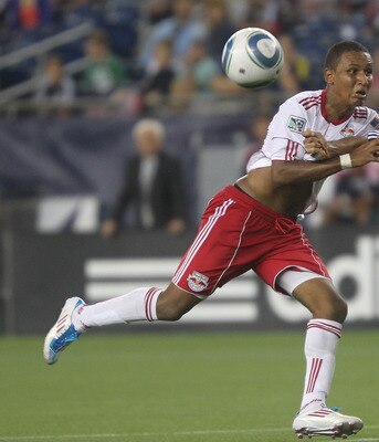 FOXBORO, MA - AUGUST 20: Juan Agudelo #17 of the New York Red Bulls battles Kevin Alston #30 of the New England Revolution at Gillette Stadium on August 20, 2011 in Foxboro, Massachusetts. (Photo by Jim Rogash/Getty Images)