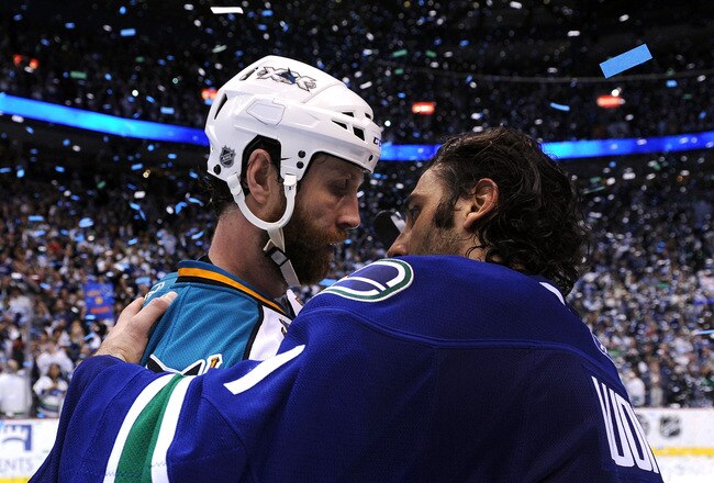 VANCOUVER, CANADA - MAY 24:  Goaltender Roberto Luongo #1 of the Vancouver Canucks shakes hands with Joe Thornton #19 of the San Jose Sharks after the Canucks defeated the San Jose Sharks 3-2 in double-overtime in Game Five to win the Western Conference F