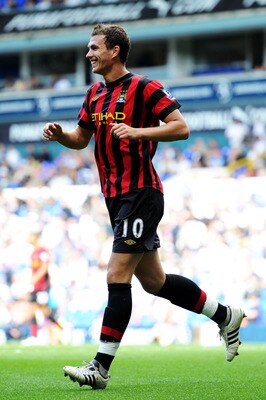 LONDON, ENGLAND - AUGUST 28:  Edin Dzeko of Manchester City celebrates scoring his fourth goal  during the Barclays Premier League match between Tottenham Hotspur and Manchester City at White Hart Lane on August 28, 2011 in London, England.  (Photo by Mic
