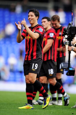 LONDON, ENGLAND - AUGUST 28:  Sami Nasri of Manchester City applauds the fans after the Barclays Premier League match between Tottenham Hotspur and Manchester City at White Hart Lane on August 28, 2011 in London, England.  (Photo by Michael Regan/Getty Im