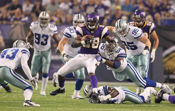 MINNEAPOLIS, MN - AUGUST 27: Adrian Peterson #28 of the Minnesota Vikings advances the ball against the Dallas Cowboys during their pre-season game at Mall of America Field on August 27, 2011 in Minneapolis, MN.  (Photo by Adam Bettcher /Getty Images)