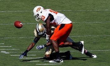 WACO, TX - OCTOBER 24:  Safety Markelle Martin #10 of the Oklahoma State Cowboys breaks up a pass to Ernest Smith #3 of the Baylor Bears at Floyd Casey Stadium on October 24, 2009 in Waco, Texas.  (Photo by Ronald Martinez/Getty Images)
