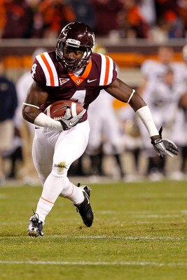 BLACKSBURG, VA - NOVEMBER 04:  Running back David Wilson #4 of the Virginia Tech Hokies runs with the ball against the Georgia Tech Yellow Jackets at Lane Stadium on November 4, 2010 in Blacksburg, Virginia.  (Photo by Geoff Burke/Getty Images)
