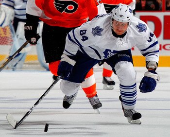 PHILADELPHIA - OCTOBER 23:  Mikhail Grabovski #84 of the Toronto Maple Leafs skates with the puck during a hockey game against the Philadelphia Flyers at the Wells Fargo Center on October 23, 2010 in Philadelphia, Pennsylvania.  (Photo by Paul Bereswill/G