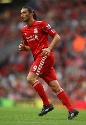 LIVERPOOL, ENGLAND - AUGUST 06:  Andy Carroll of Liverpool in action during the pre season friendly match between Liverpool and Valencia at Anfield on August 6, 2011 in Liverpool, England.  (Photo by Clive Brunskill/Getty Images)