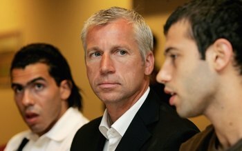 LONDON - SEPTEMBER 05:  (L-R) Carlos Tevez, West Ham manager Alan Pardew and Javier Mascherano talk to the press during a West Ham United press conference to unveil their new signings at Upton Park on September 5, 2006 in London, England.  (Photo by Chris