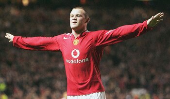 MANCHESTER, ENGLAND - SEPTEMBER 28:  Wayne Rooney of Manchester United celebrates his second goal during the UEFA Champions League Group D match between Manchester United and Fenerbahce SK at Old Trafford, on September 28, 2004 in Manchester, England.  (P