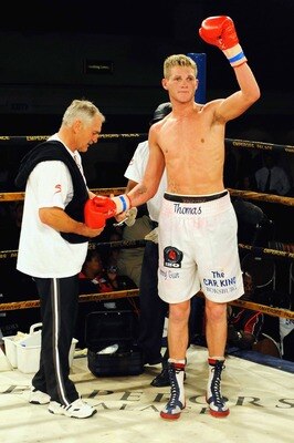 KEMPTON PARK, SOUTH AFRICA - SEPTEMBER 12:  Thomas Oosthuizen (white trunks) during the IBO Youth Super Middleweight Title match between Thomas Oosthuizen (white trunks) and Cleber Argente Alves from Emperors Palace on September 12, 2009 in Kempton Park,